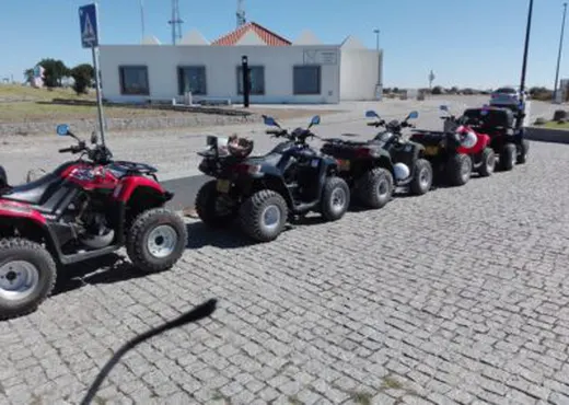 Line of quad bikes on a trail